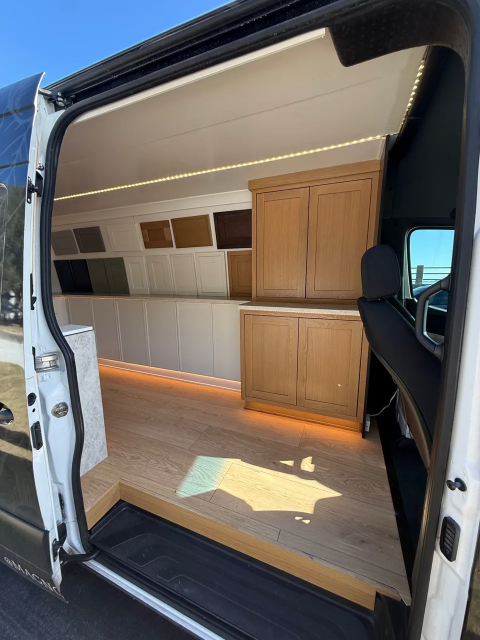 Cabinet door styles displayed inside the Magnolia mobile showroom
